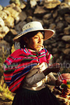 A young Bolivian girl with a colourful coat.