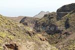 The road to Temisas leads through some spectacular serpentines with a view to curvy canyons. At the horizon, one can see the east coast of Gran Canaria.