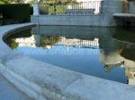 Reflection of the Palacio Real and the lion in the water