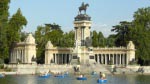 The lake of the Retiro with the generous horseman monument in the background