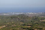 Wide view to the east coast from the hills by Felanitx: Here, to Porto Colom