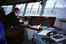 On the command bridge of the MS Narvik. The first mate has the ship easily under control.