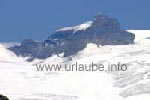 The Jungfraujoch that is accessible by mountain railway between Jungfrau and Mönch, pictured from Eggishorn